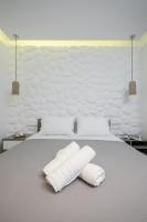 Posteľ alebo postele v izbe v ubytovaní Elegant Apartments