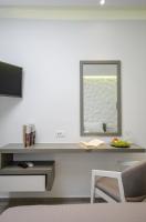 Televízia a/alebo spoločenská miestnosť v ubytovaní Elegant Apartments