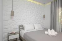 Posteľ alebo postele v izbe v ubytovaní Elegant Apartments