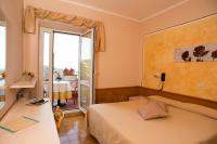 Albergo Ristorante il Fungoにあるベッド