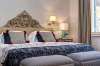 Posteľ alebo postele v izbe v ubytovaní Rocco Forte Hotel De Russie
