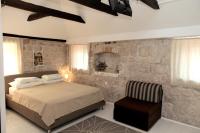 Posteľ alebo postele v izbe v ubytovaní Apartment Tragurium