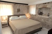 Posteľ alebo postele v izbe v ubytovaní Apartment Tragurium