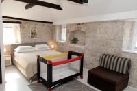 Posteľ alebo postele v izbe v ubytovaní Apartment Tragurium