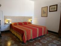 A bed or beds in a room at B&B Porta della Terra