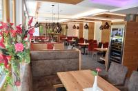 Reštaurácia alebo iné gastronomické zariadenie v ubytovaní Hotel Schladmingerhof