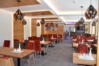 Reštaurácia alebo iné gastronomické zariadenie v ubytovaní Hotel Schladmingerhof