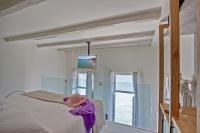 Televízia a/alebo spoločenská miestnosť v ubytovaní Thalassa Boutique Hotel