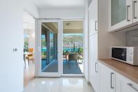 Kuchyň nebo kuchyňský kout v ubytování Apartment Maro Bayview