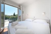 Postel nebo postele na pokoji v ubytování Apartment Maro Bayview