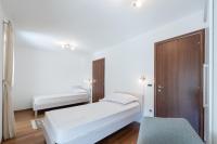 Postel nebo postele na pokoji v ubytování Apartment Maro Bayview