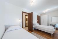 Postel nebo postele na pokoji v ubytování Apartment Maro Bayview