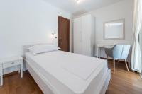 Postel nebo postele na pokoji v ubytování Apartment Maro Bayview