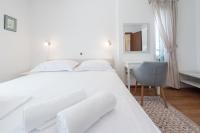 Postel nebo postele na pokoji v ubytování Apartment Maro Bayview