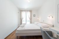 Postel nebo postele na pokoji v ubytování Apartment Maro Bayview