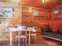 Posezení v ubytování Cabañas de Madera Sanabria