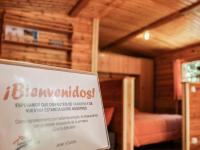 Postel nebo postele na pokoji v ubytování Cabañas de Madera Sanabria