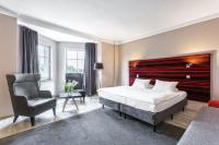 Łóżko lub łóżka w pokoju w obiekcie Hotel Kaliski