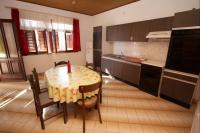 Kuchyň nebo kuchyňský kout v ubytování Apartments Stanko