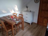 A kitchen or kitchenette at Pécsely apartman