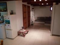 A kitchen or kitchenette at Pécsely apartman