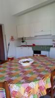 A kitchen or kitchenette at Villa Magnolia Appartamenti
