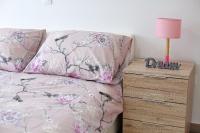 Posteľ alebo postele v izbe v ubytovaní Apartmani Lavanda