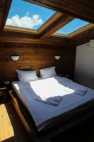 Postel nebo postele na pokoji v ubytování Guest House Ognyanovo