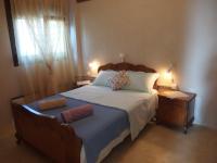 A bed or beds in a room at Villa Iris