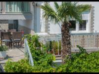 A garden outside Namare Luxury Apartments