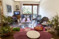 A television and/or entertainment centre at Residenza Talenti Superior Rooms