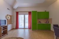 Televízia a/alebo spoločenská miestnosť v ubytovaní Apartment Lavanda 2