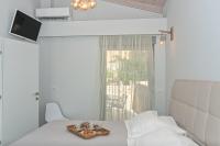 Postel nebo postele na pokoji v ubytování Aenaon Seaview Villa