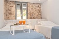 Postel nebo postele na pokoji v ubytování Aenaon Seaview Villa