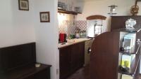 A kitchen or kitchenette at Casina in pietra