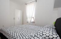 Postel nebo postele na pokoji v ubytování Apartman Kimi