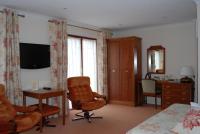 TV a/nebo společenská místnost v ubytování The Priory Hotel