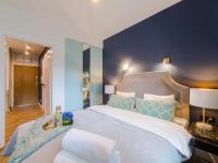 Posteľ alebo postele v izbe v ubytovaní Apartament DWIE SOSNY