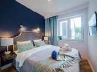 Posteľ alebo postele v izbe v ubytovaní Apartament DWIE SOSNY