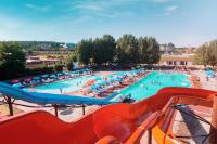 a large swimming pool with people in it at Holiday Resort in Velika Slatina