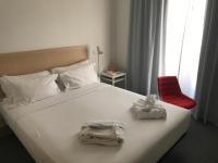 Postel nebo postele na pokoji v ubytování Hotel Convento do Salvador