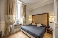Posteľ alebo postele v izbe v ubytovaní 939 Hotel