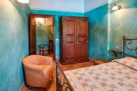 A bed or beds in a room at Agriturismo Il Molino Antico - 5 Girasoli