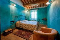 A bed or beds in a room at Agriturismo Il Molino Antico - 5 Girasoli