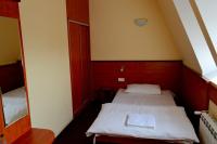 Łóżko lub łóżka w pokoju w obiekcie Hotel Wielkopolanka