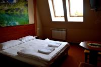 Łóżko lub łóżka w pokoju w obiekcie Hotel Wielkopolanka