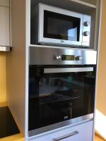 Kuchyň nebo kuchyňský kout v ubytování Apartmány Pinie Lipno