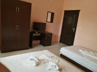 Postel nebo postele na pokoji v ubytování Guest House Karaulanov