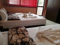 Postel nebo postele na pokoji v ubytování Guest House Karaulanov
