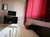 Postel nebo postele na pokoji v ubytování Guest House Karaulanov